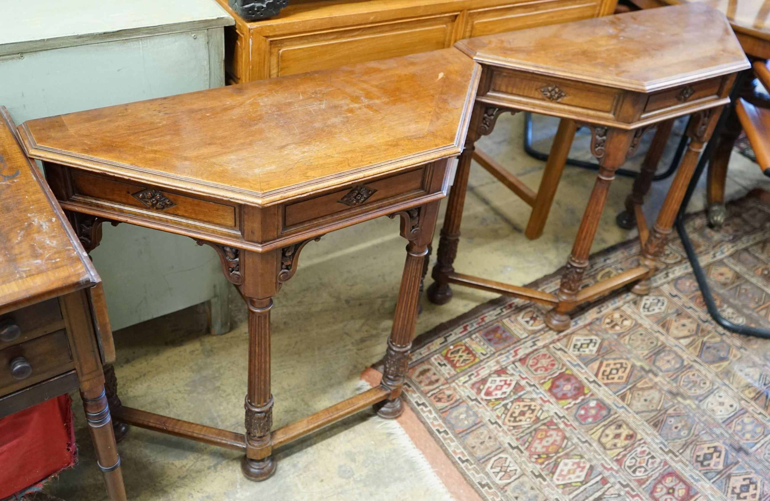 A pair of early 20th century carved mahogany console tables, width 89cm, depth 34cm, height 75cm